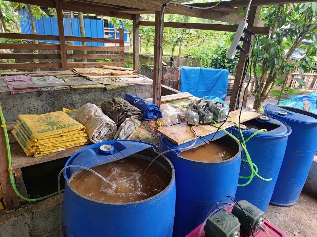 Bio-solution processing setup with aerated barrels at the demo farm
