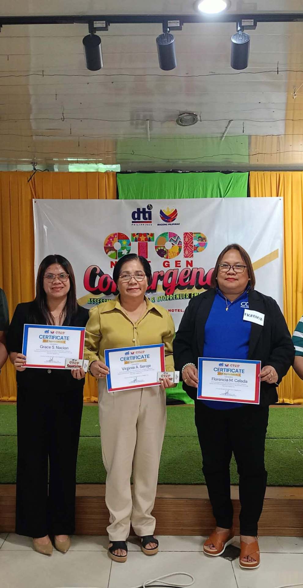 MIFAMCO representatives with DTI OTOP certificates of appreciation